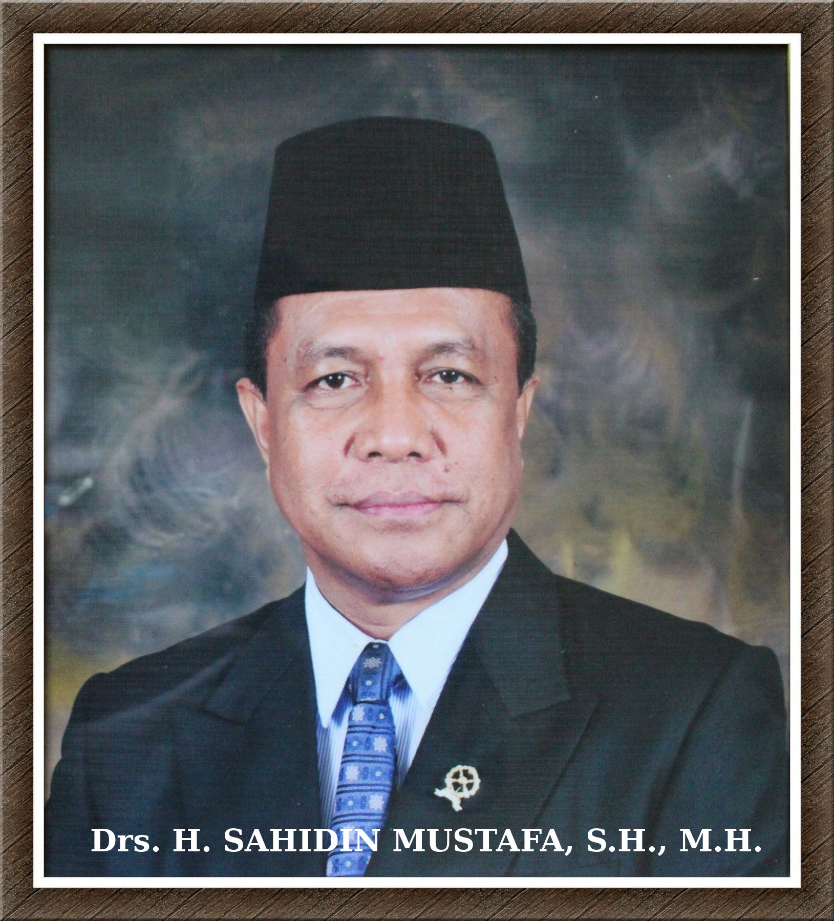 Drs. H. SAHIDIN MUSTAFA S.H. M